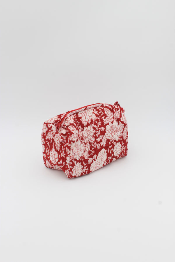Cotton hand-block make up bag with two inside pockets in red base and white floral print.