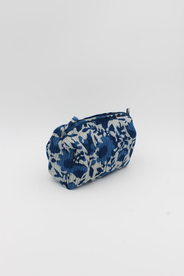 Beautiful Blue floral hand stamped make up bag with two inside pockets.